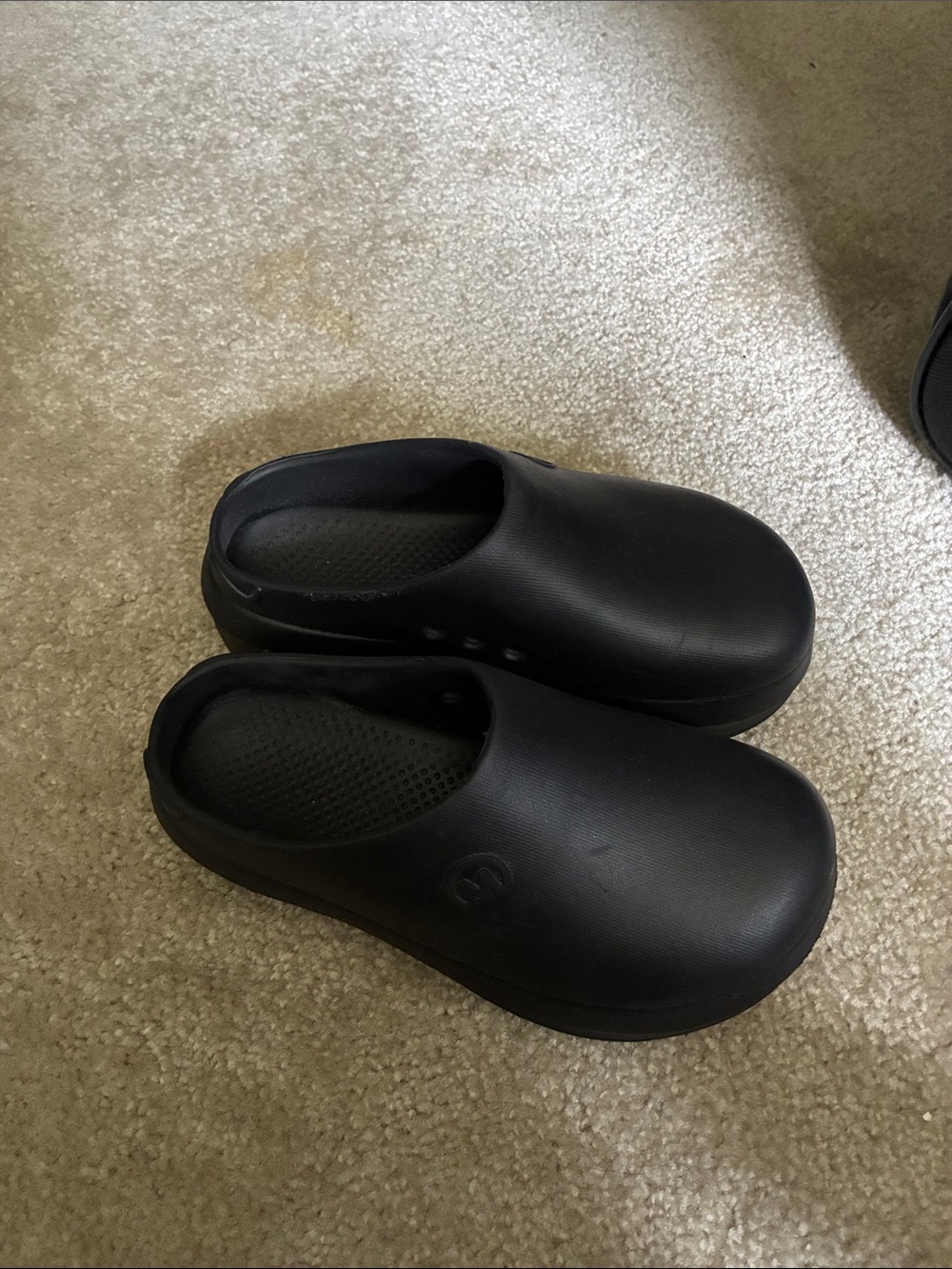 Women's Slip-On Clog Mules in Black.